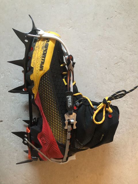 Comparing Microspikes and Crampons - Crampons seen from the side of the boot