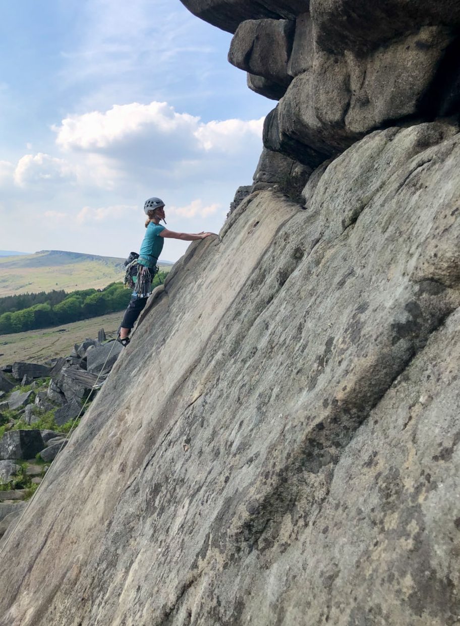 The starting slab of the classic route Flying Buttress at Stanage during a Learn to Lead rock climbing course in the Peak District