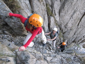 Scramblers ascending Sinister Gully on Bristly Ridge, Glyder Fach, during an introduction to scrambling course