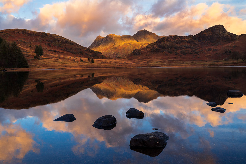 The Langdale Pikes in the Lake District, seen from Blea Tarn in the early morning